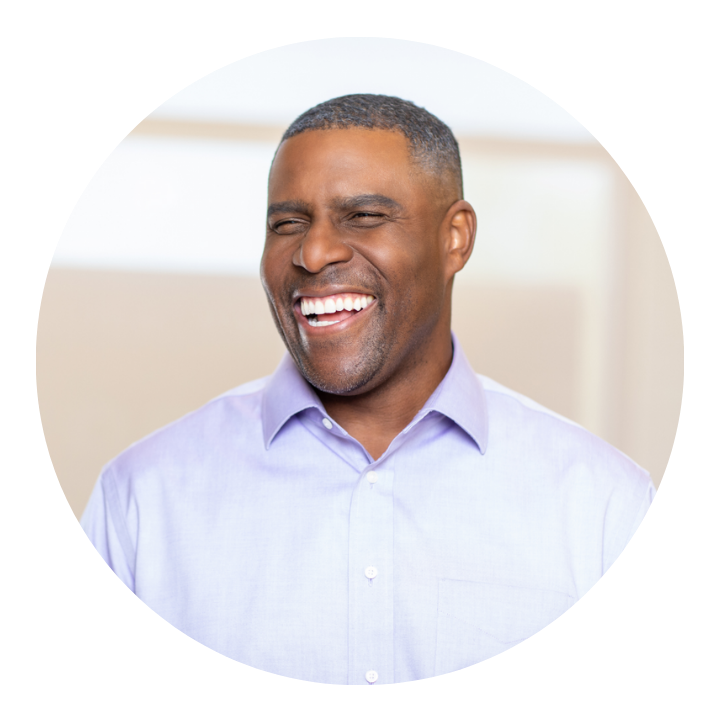 A happy man after his free initial comprehensive exam with Aspen Dental.